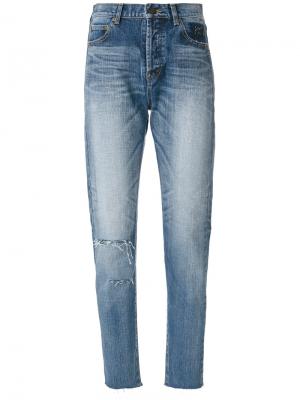 Состаренные зауженные джинсы Saint Laurent. Цвет: синий