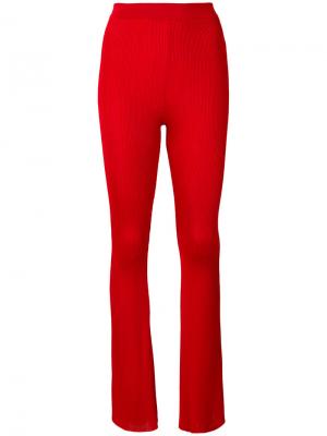 Расклешенные брюки с ребристой фактурой Givenchy. Цвет: красный