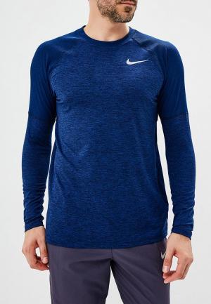 Лонгслив спортивный Nike. Цвет: синий