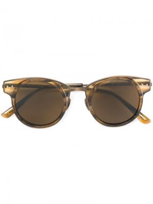 Солнцезащитные очки в круглой оправе Bottega Veneta Eyewear. Цвет: металлический