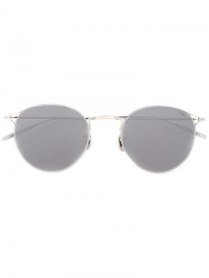 Солнцезащитные очки в круглой оправе Eyevan7285. Цвет: металлический