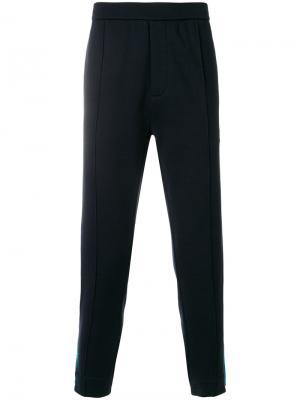 Спортивные брюки с полосками по бокам Prada. Цвет: синий