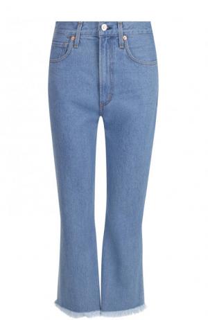 Укороченные расклешенные джинсы с потертостями Citizens Of Humanity. Цвет: голубой